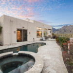 Foothills home at twilight with mountain views
